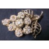 Vintage goudkleurige broche in bloemvorm