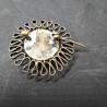 Ronde, vintage broche met bolle donkere steen